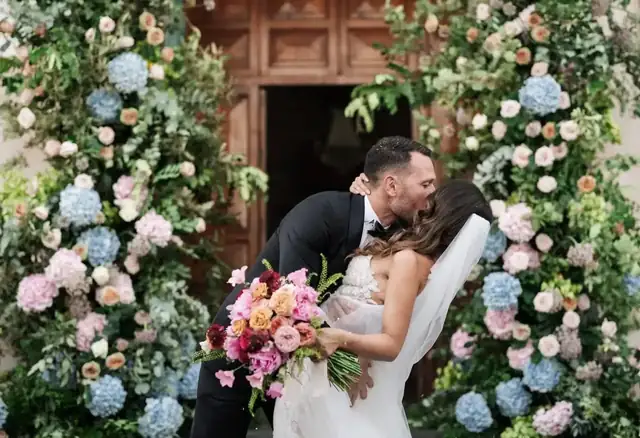 Outdoor garden wedding reception prepared with an elegant weather plan in Italy